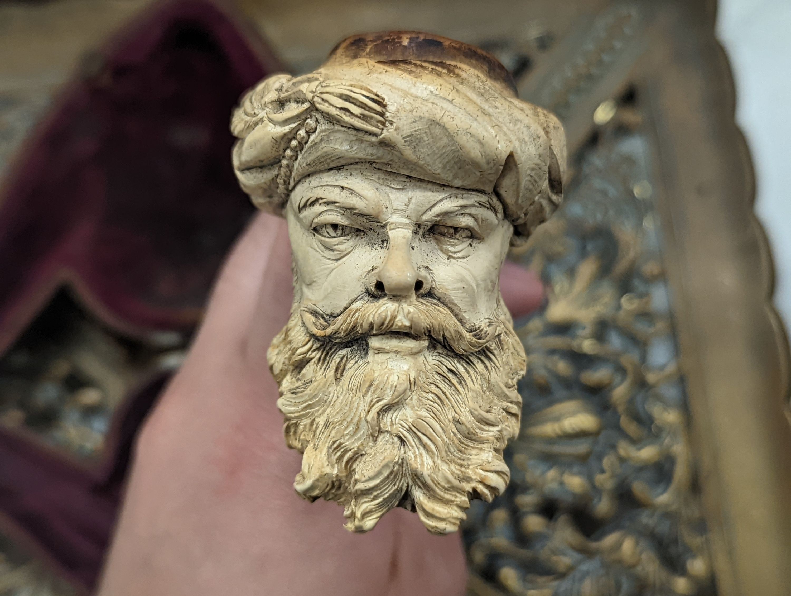 A Meerschaum pipe, a copper casket and brass stand